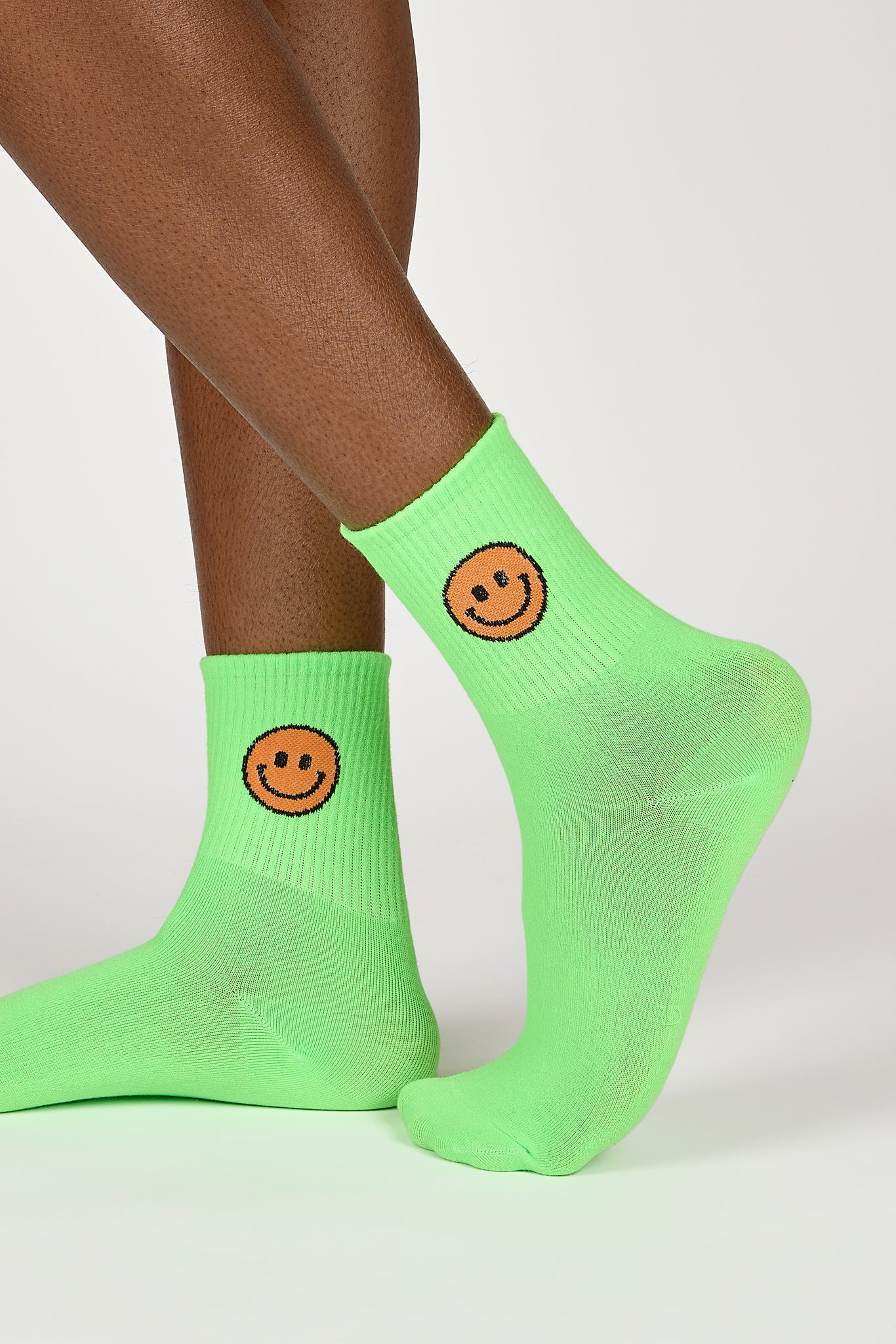 Neon green smiley face socks_1