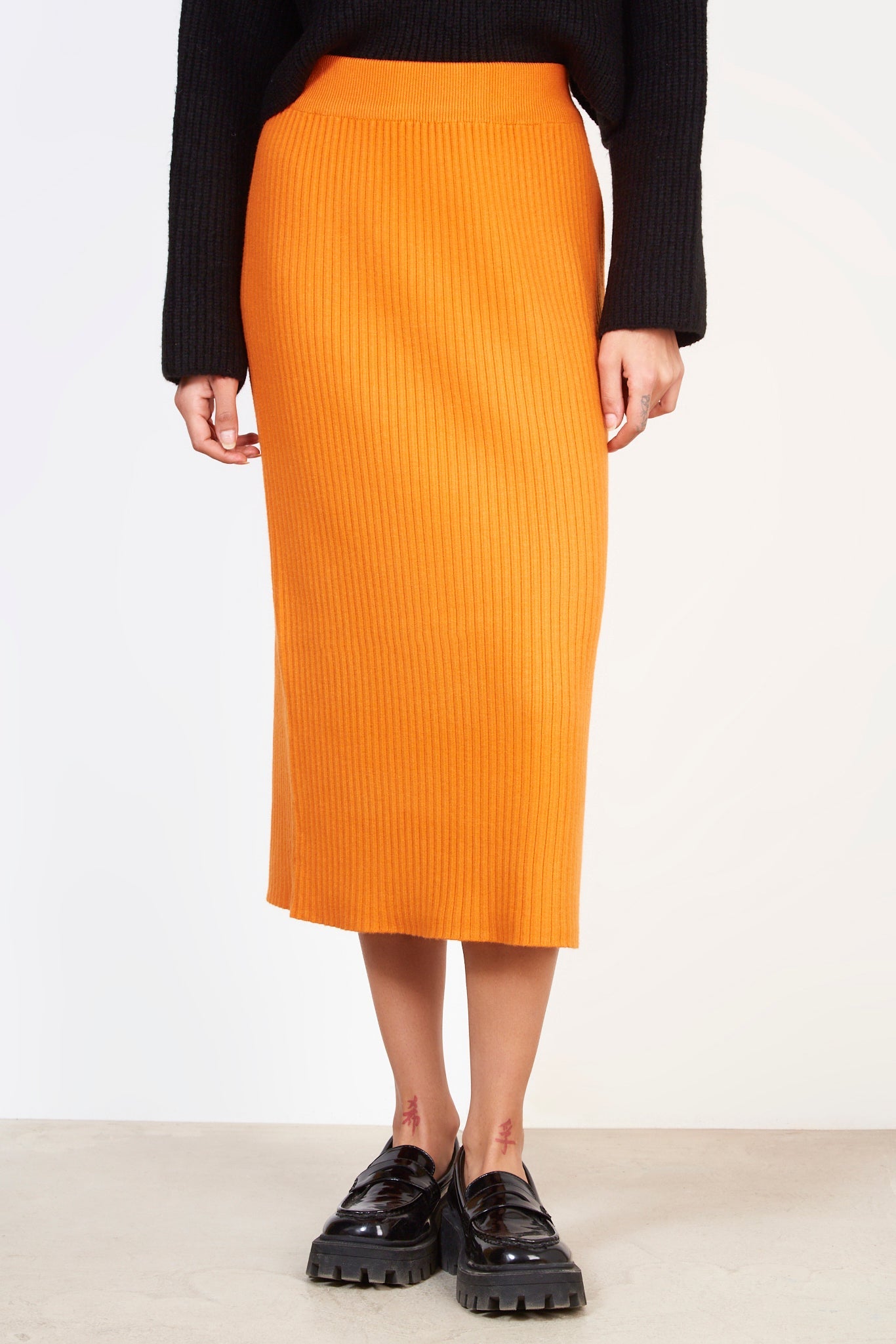 Orange ribbed knit maxi skirt