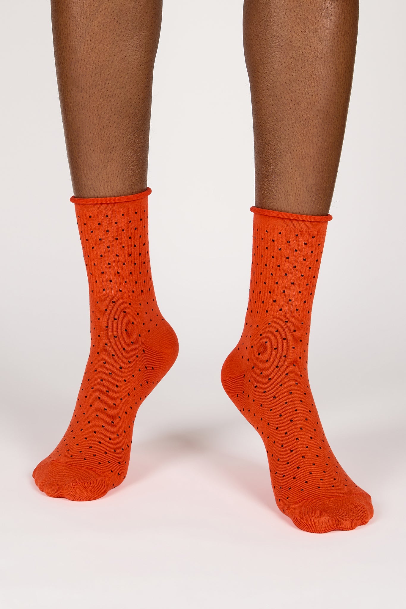 Red-orange and black polka dot roll trim socks_2