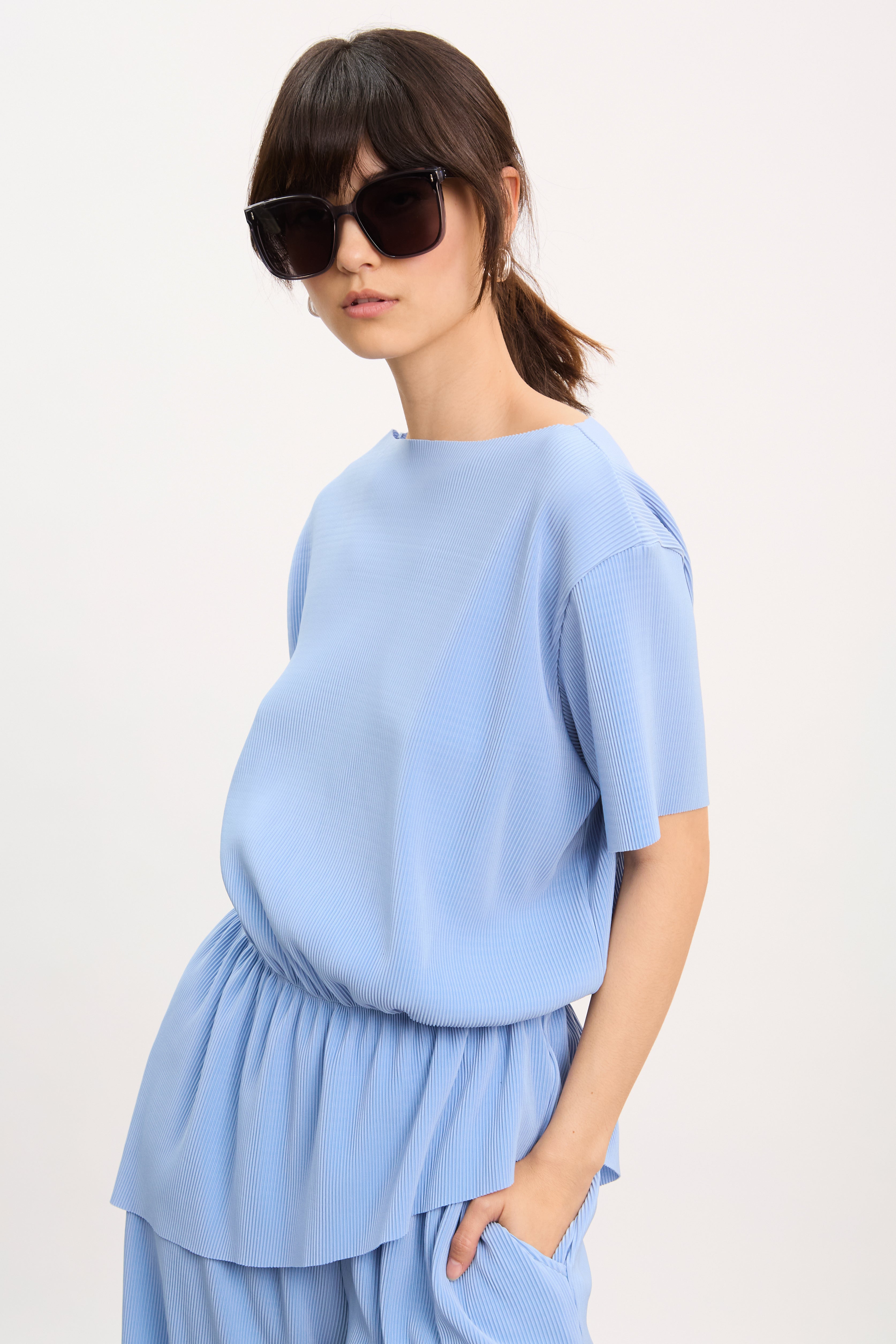 Sky blue ribbed asymmetric hem top_1