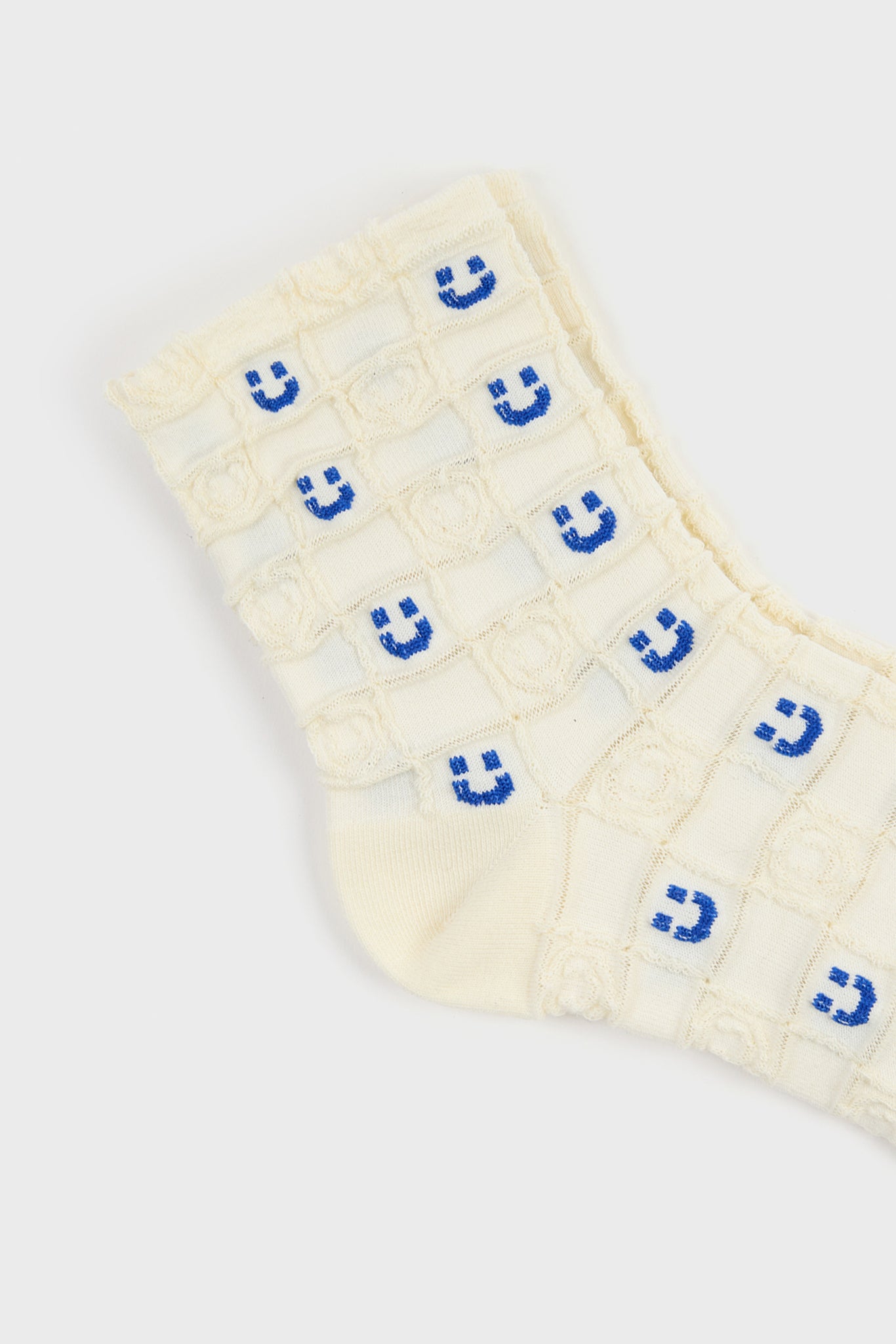 White and black checked smiley face socks_4