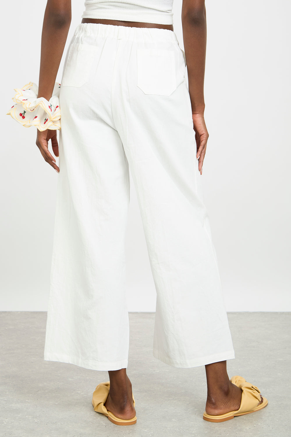 White linen blend wide leg drawstring trousers_2