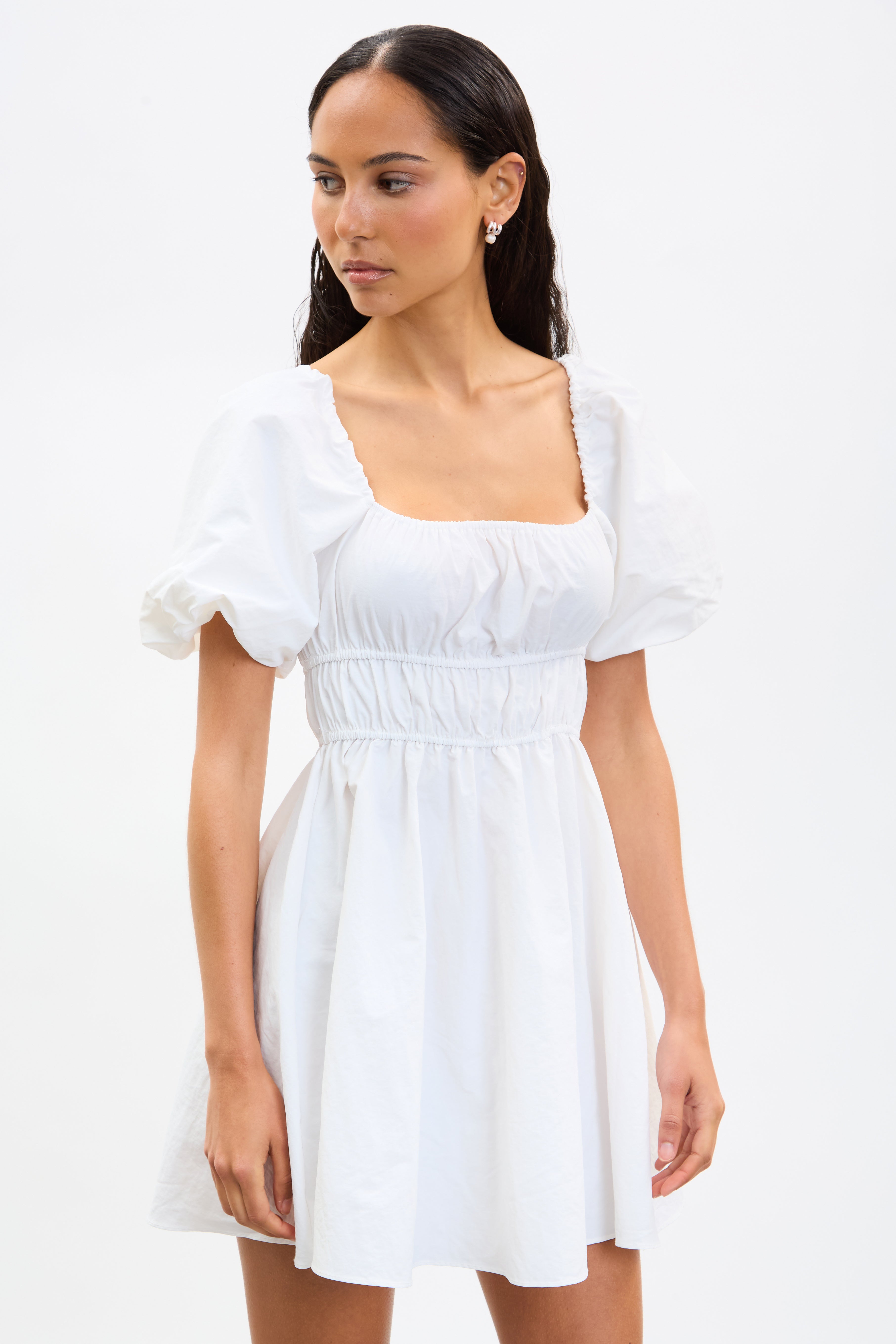 White puff sleeve open back mini dress_3