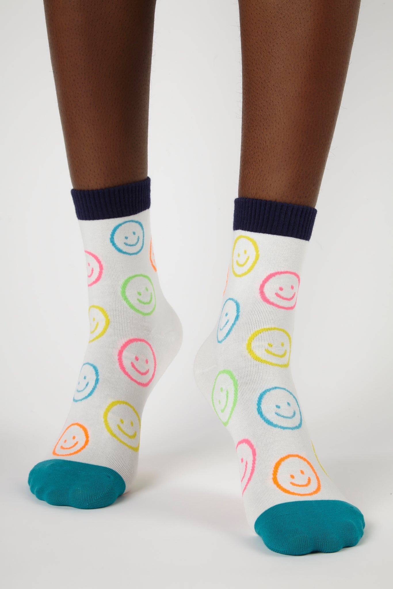 White neon smiley face socks_4