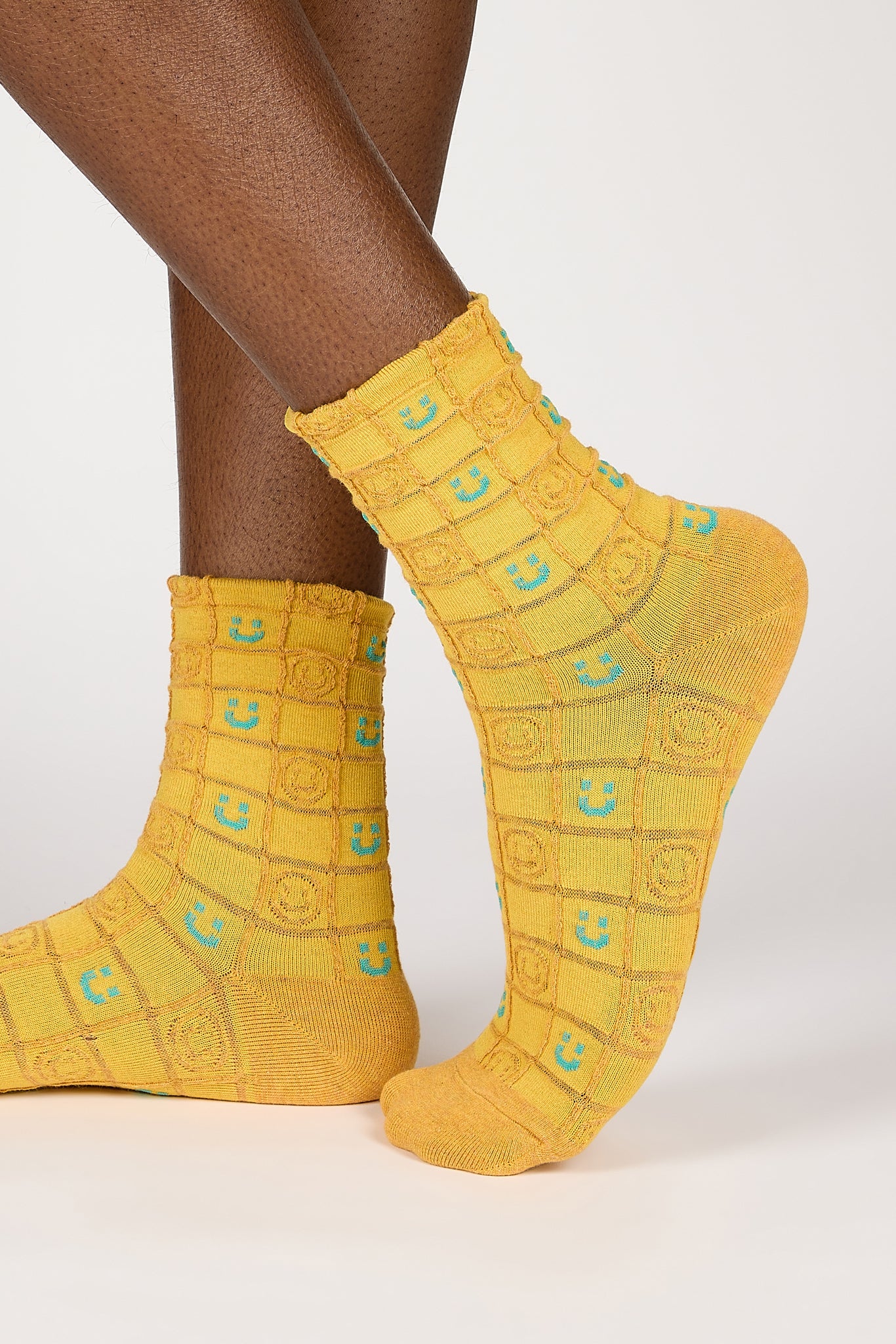 Yellow and green checked smiley face socks_1