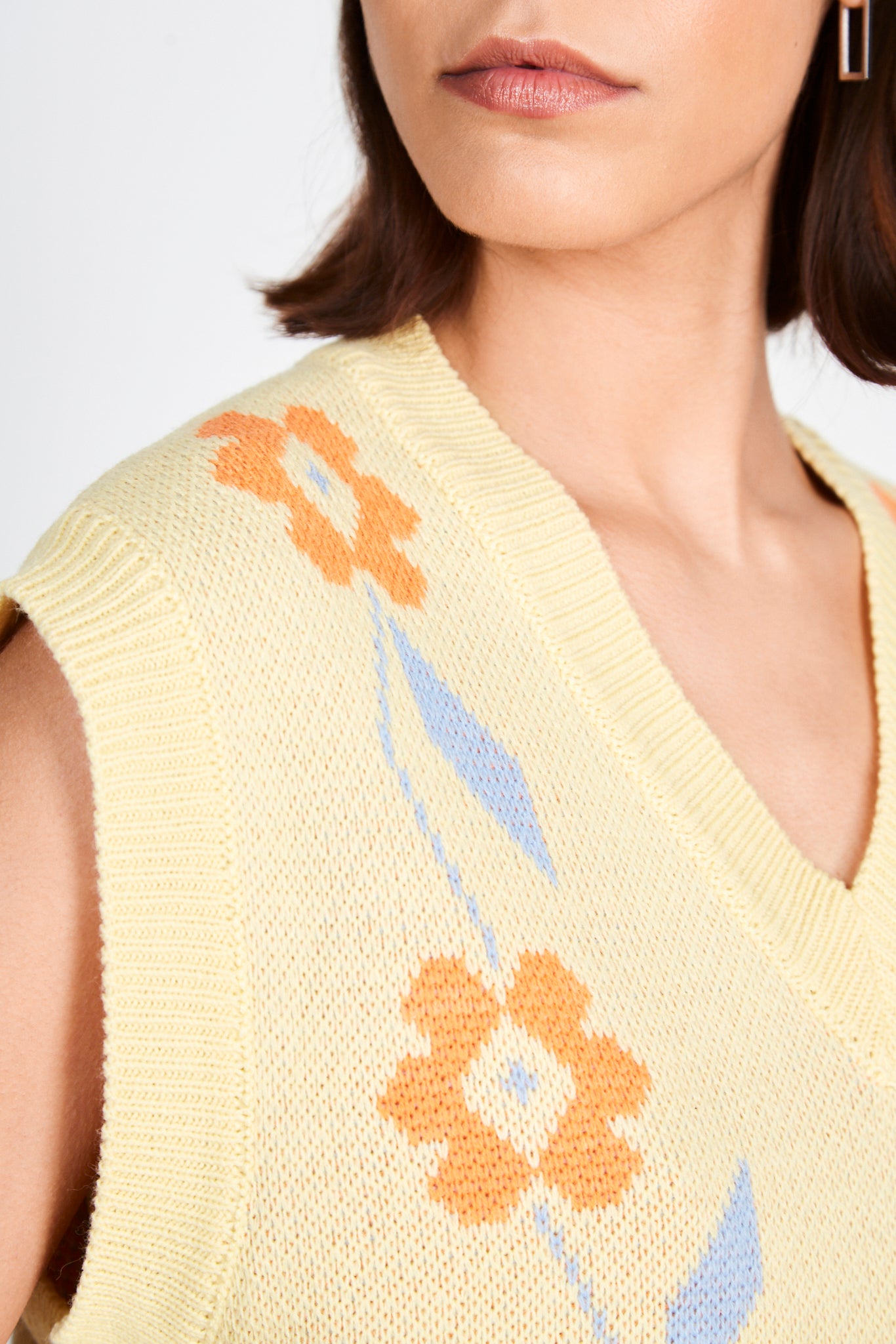 Yellow and orange intarsia large floral sweater vest