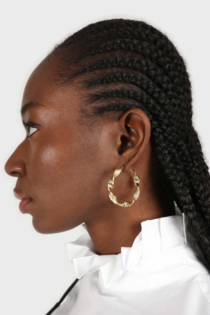 Gold rough smooth twisted hoop earrings_6