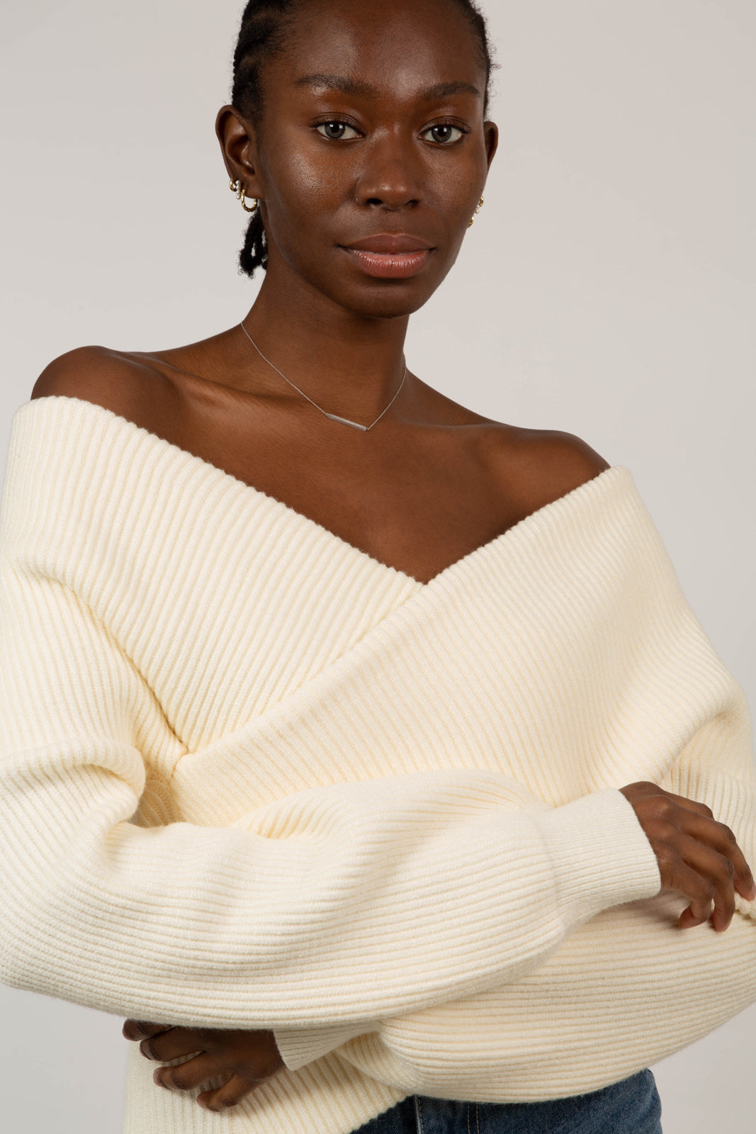 cross front panel knit top