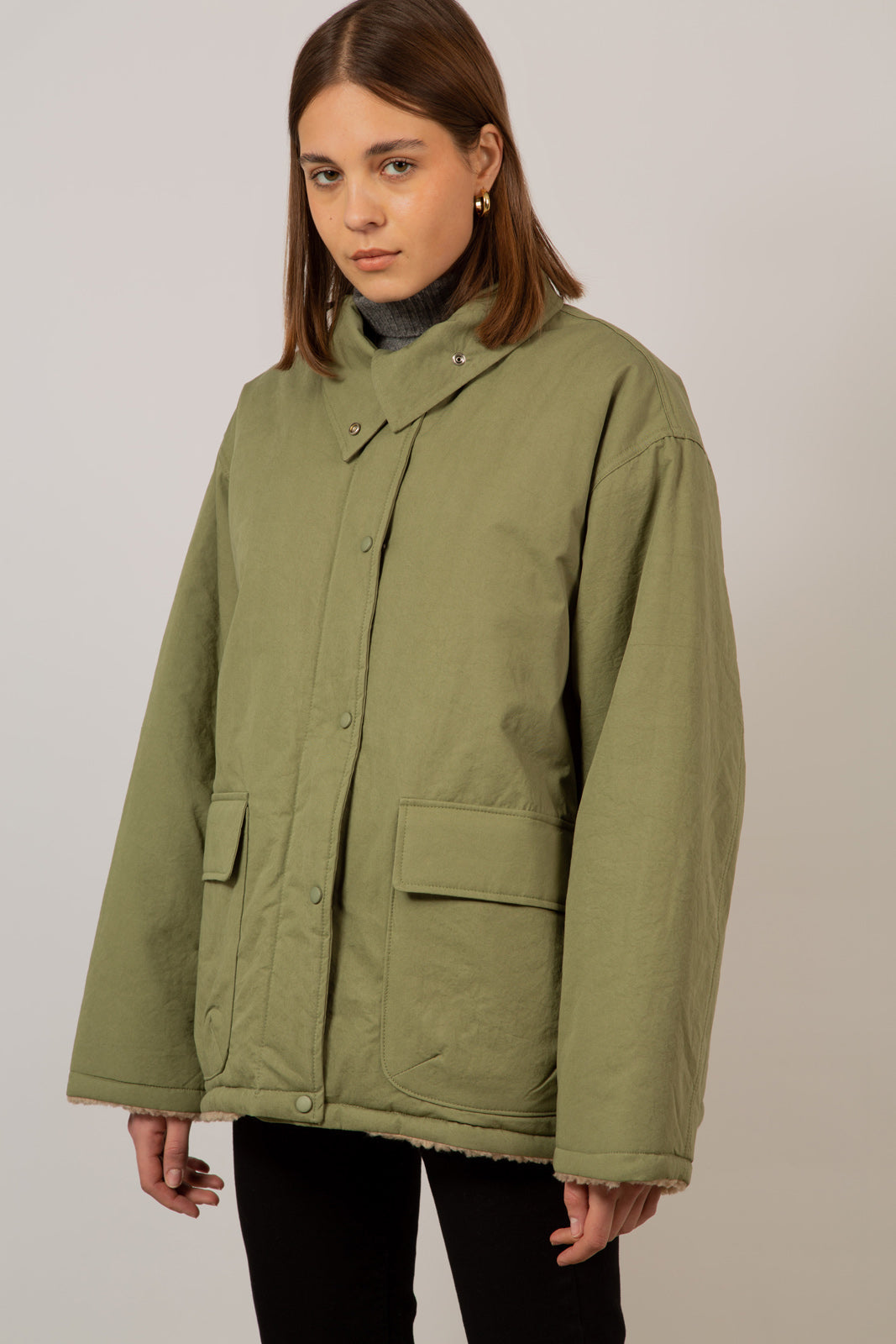 Pale teddy lined cinch back parka