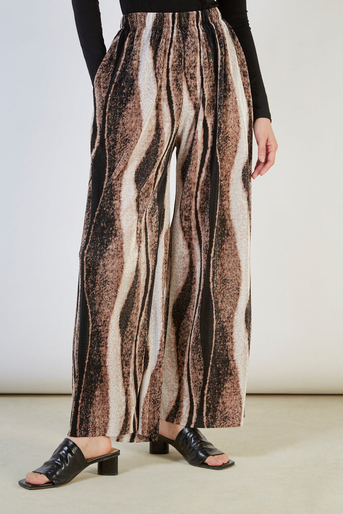 Beige and black abstract print trousers_3
