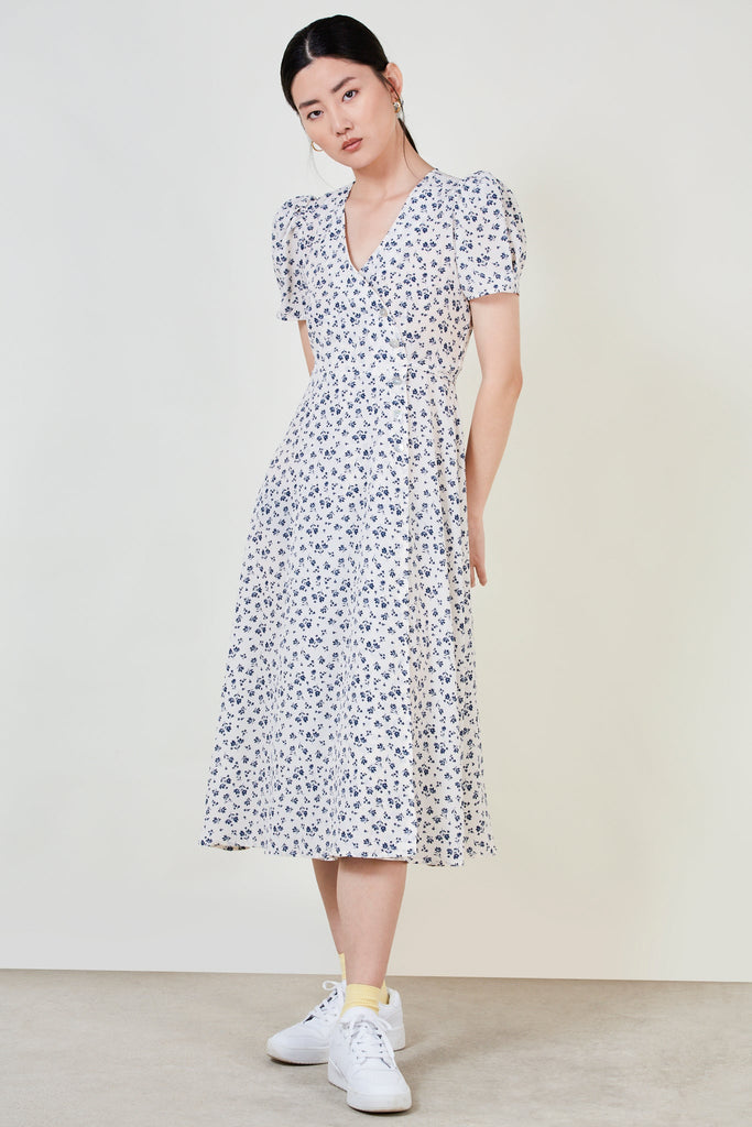 Ivory and blue floral print side button dress_1