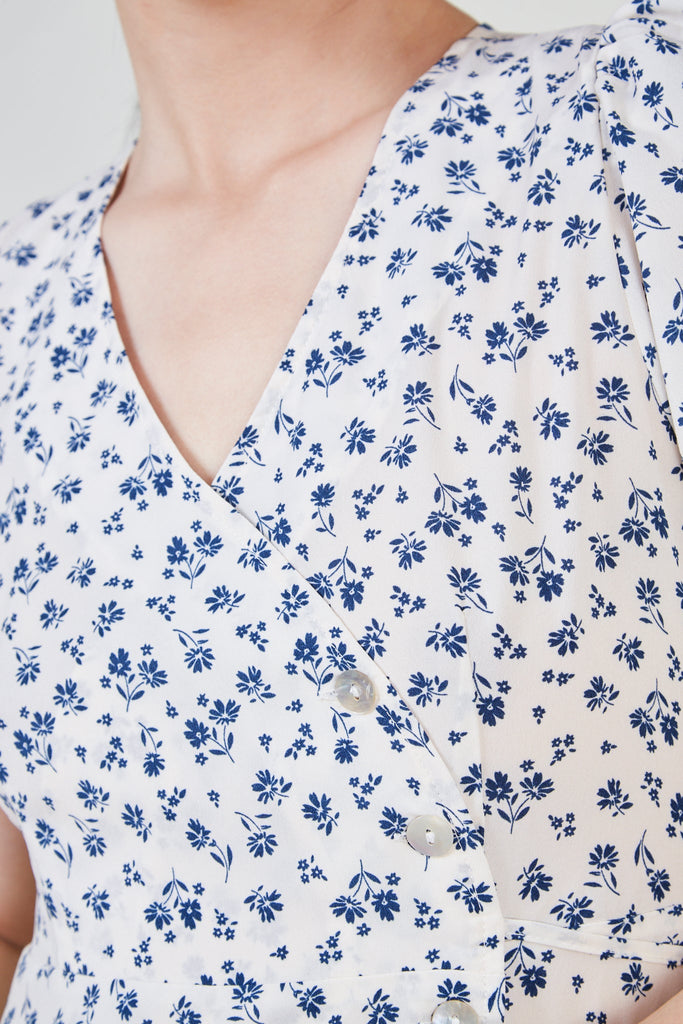 Ivory and blue floral print side button dress_5