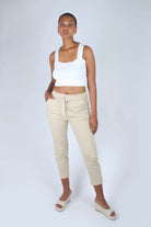 Beige dart front loose fit drawstring trousers_1