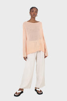 Pale orange wide neck long sleeved loose knit top_3