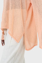 Pale orange wide neck long sleeved loose knit top_7