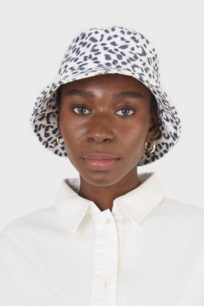 Ivory and navy leopard print bucket hat_1