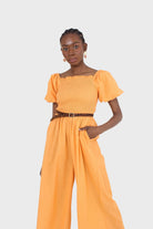 Orange short sleeved ruched bodice jumpsuit_11