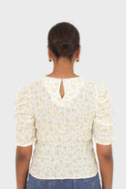 Yellow floral smocked short sleeved blouse_4