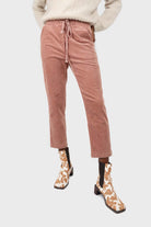 Pale pink corduroy drawstring loose fit trousers_1