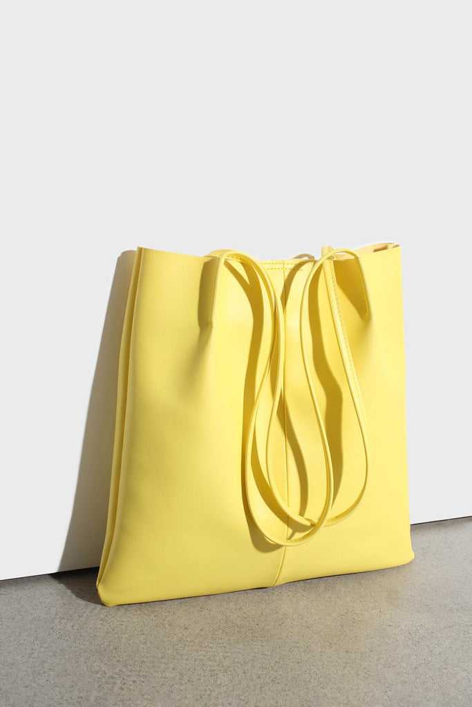 Bright yellow vegan leather pinched strap tote bag_1