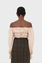 Yellow floral smocked crop blouse_9