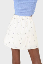 Ivory daisy print asymmetric tie skort_4