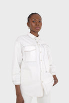 Ivory and black contrast stitch metal button shirt_1