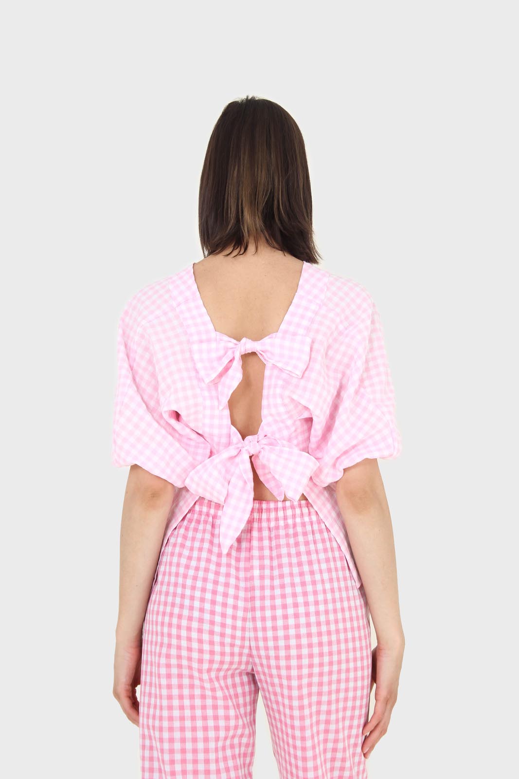Pink gingham tie back puff sleeved top_1