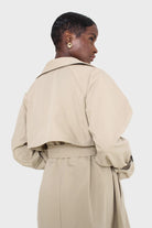 Light beige single breasted buckle detail trench coat_5