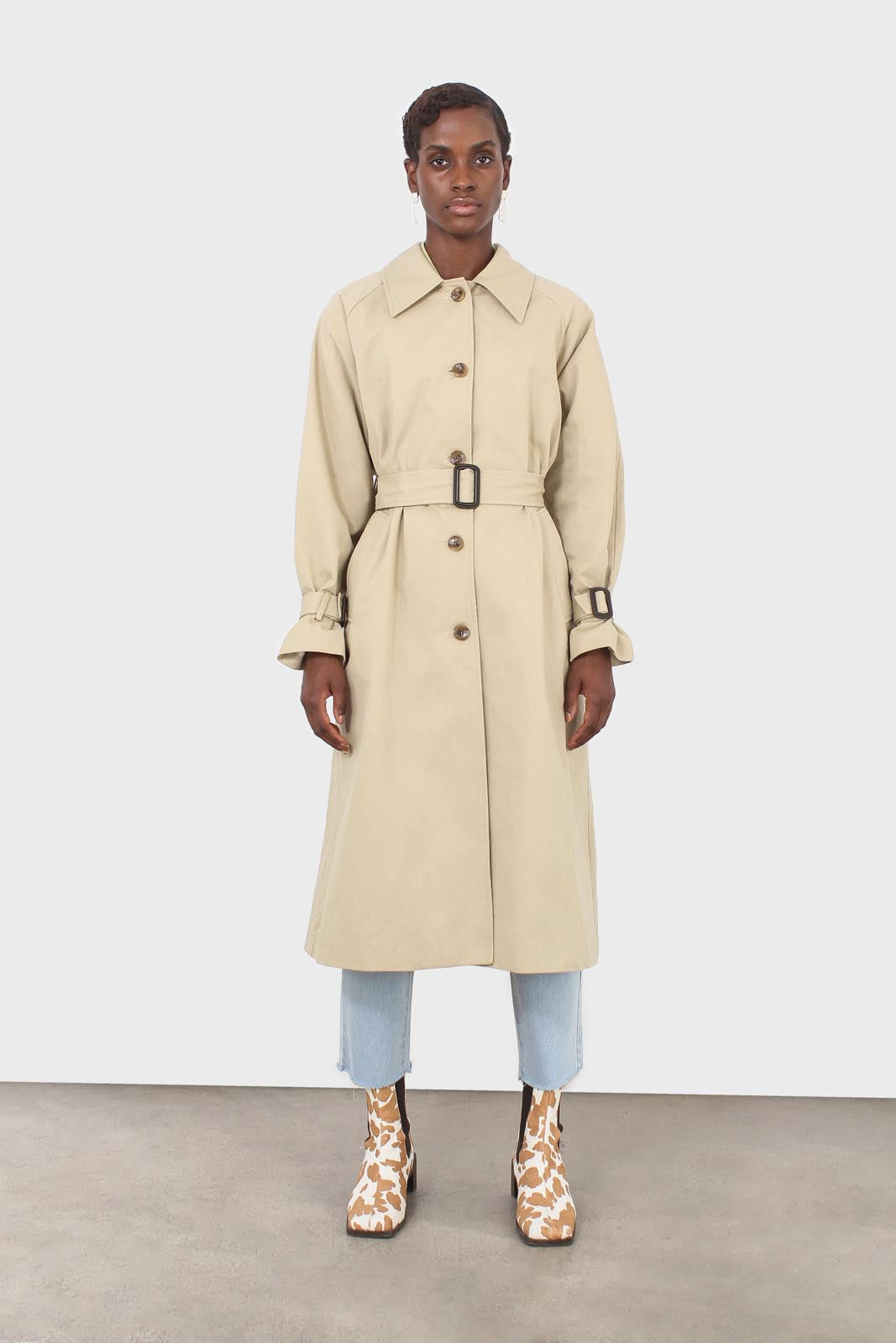 Light beige single breasted buckle detail trench coat_1