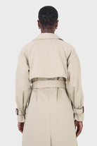 Light beige single breasted buckle detail trench coat_8