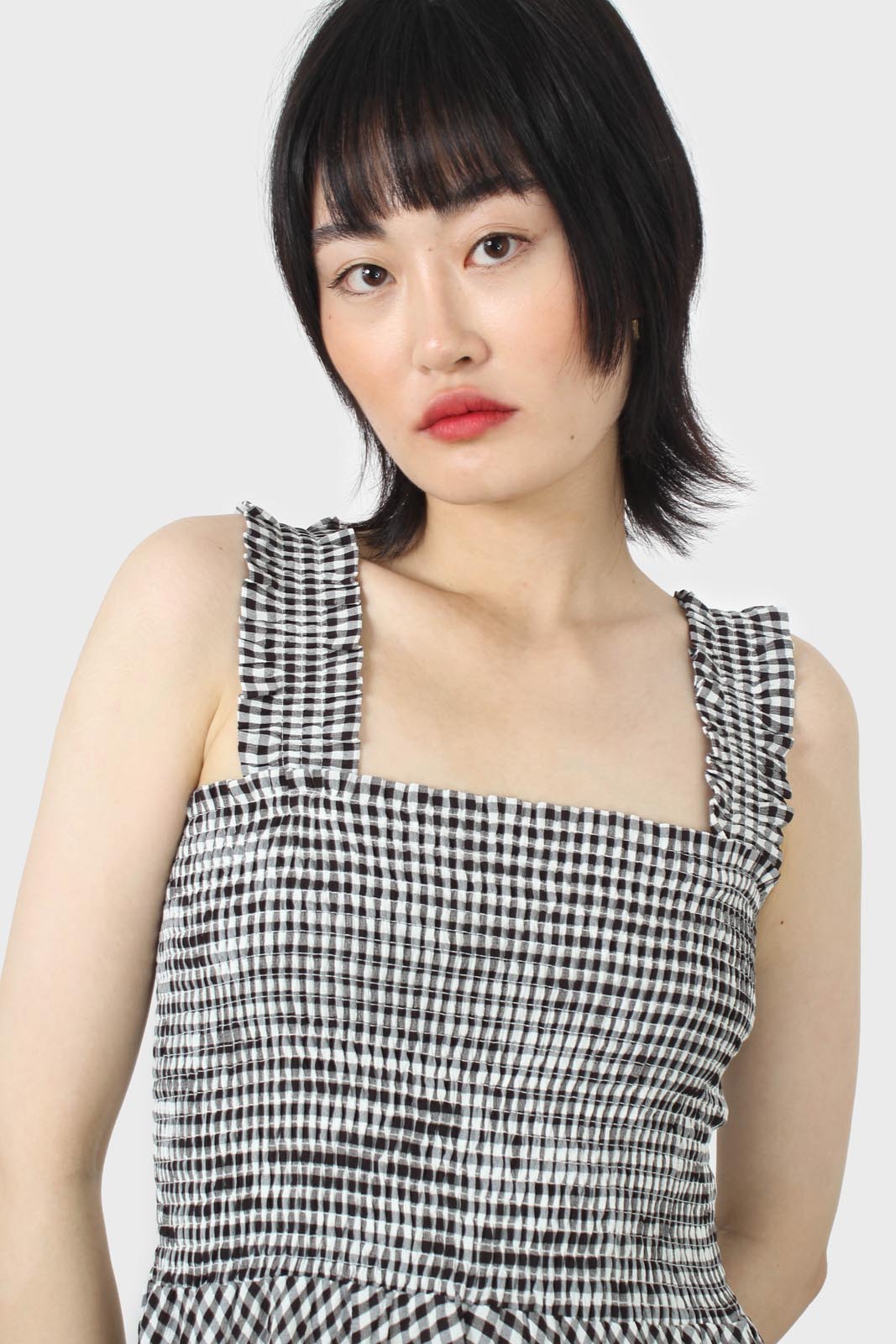 Black and white gingham ruched bodice dress