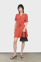 Orange and ivory floral puffed sleeve wrap mini dress_11