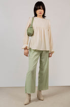 Beige ruffle trim seamed yoke blouse_3