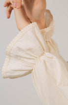 Beige ruffle trim seamed yoke blouse_6