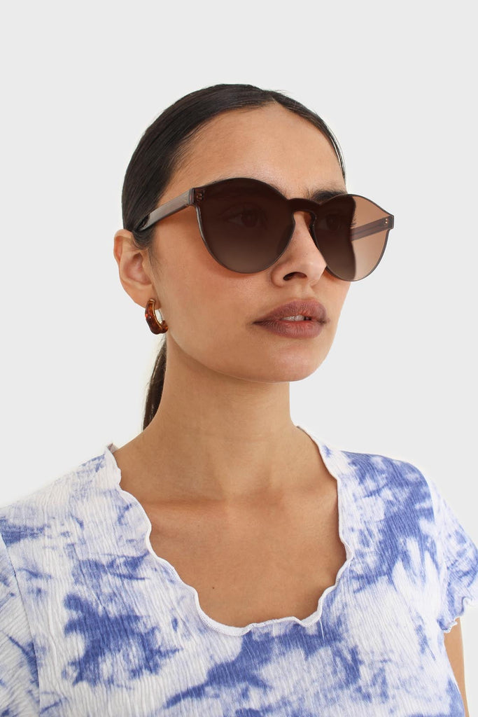Brown frameless round sunglasses_5