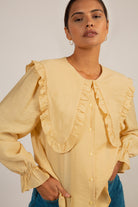 Mustard long ruffle trim collar blouse_1