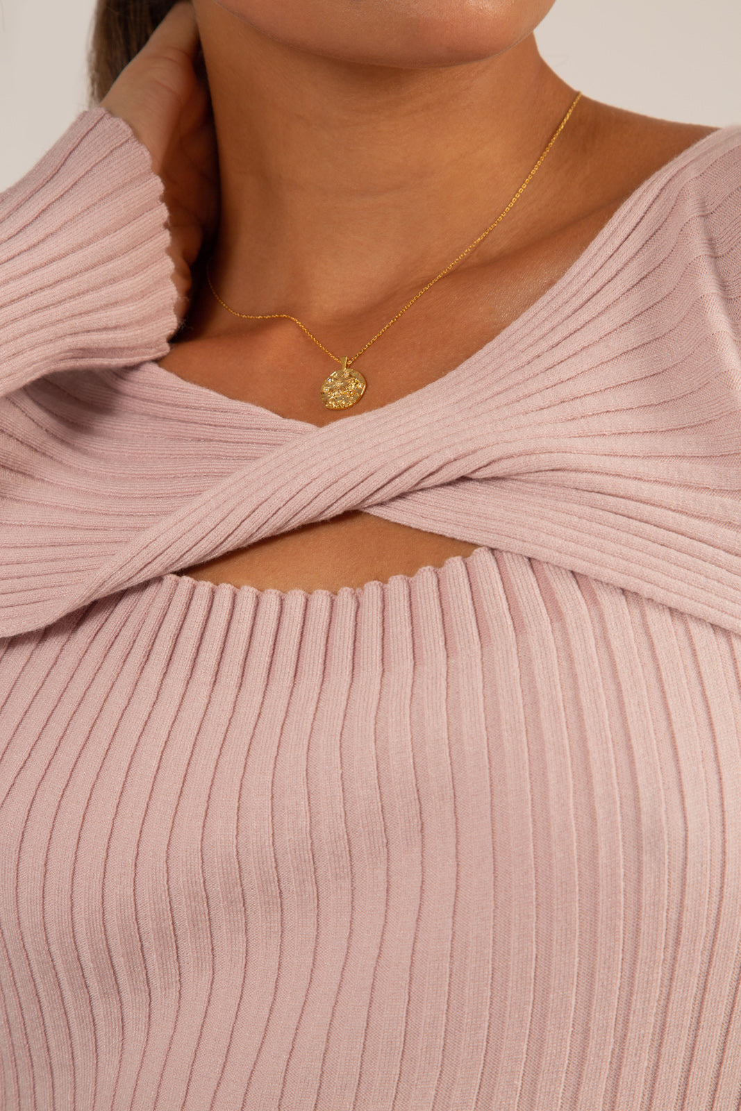 Pink peek twist front knit top