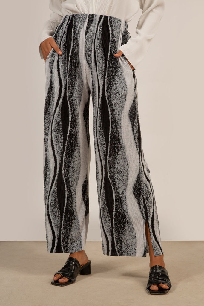 Grey and black abstract print trousers_1