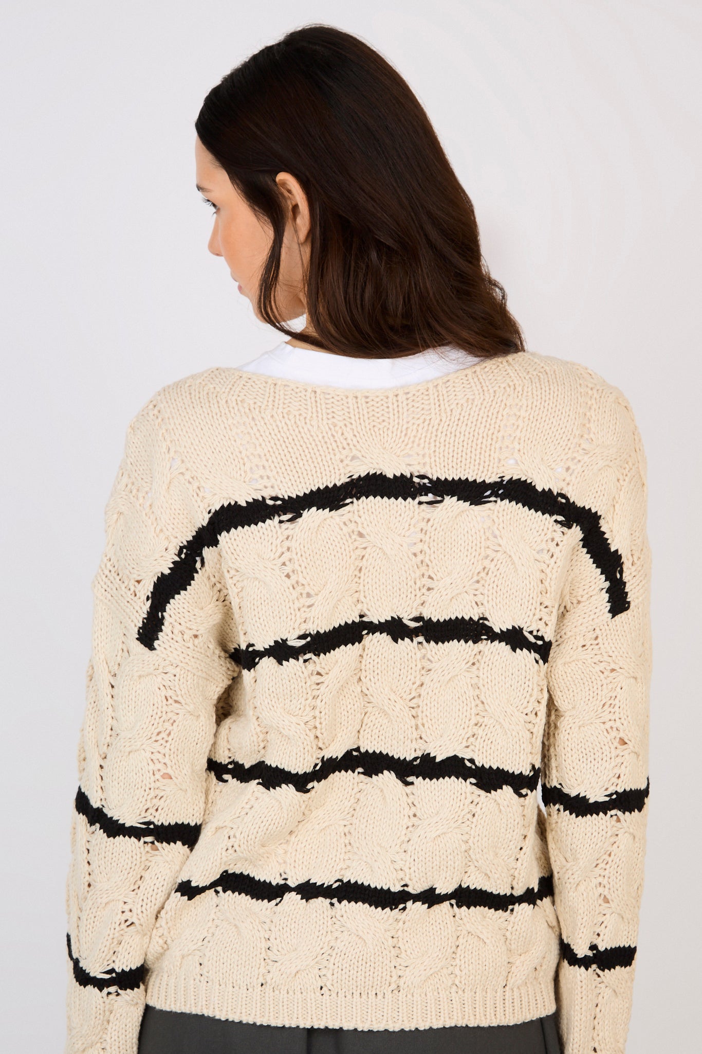 Beige and black striped cable knit jumper