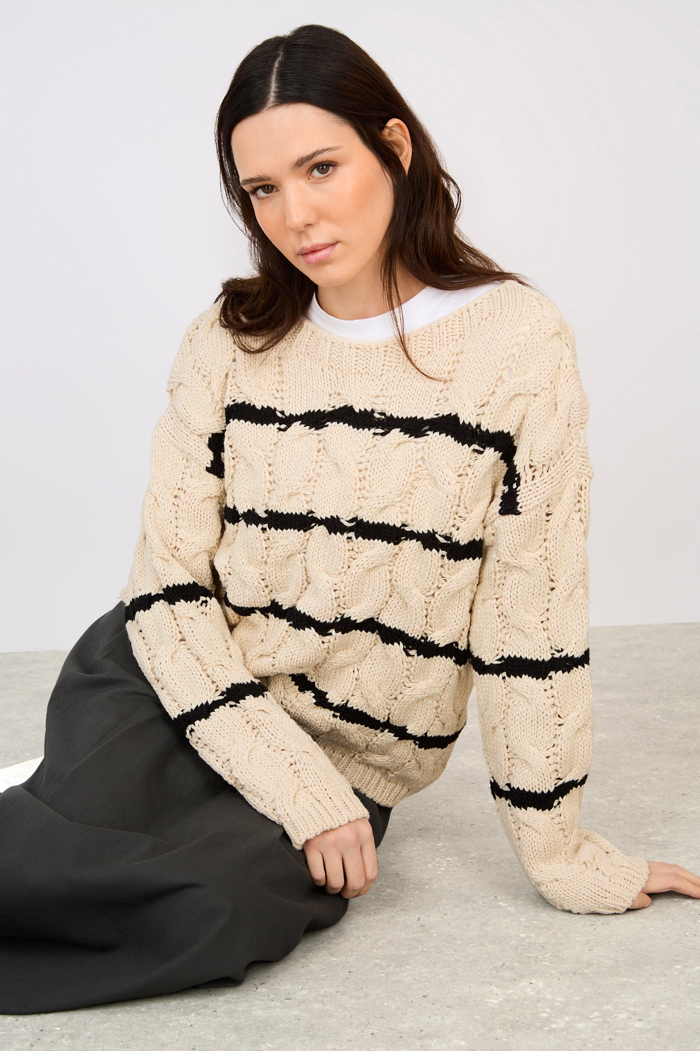 Beige and black striped cable knit jumper