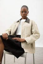 Beige and black vegan leather contrast collar parka_5