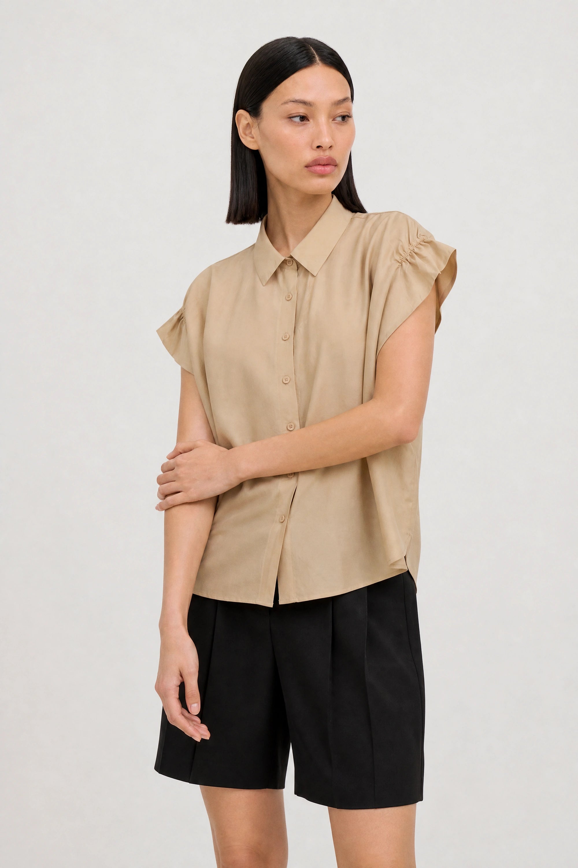 Beige gathered shoulder short sleeved shirt_1