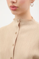 Beige textured button up mock neck top_3