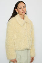 Beige thick faux fur collared jacket_1