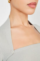 Beige ribbed knit double button draped jumper_5