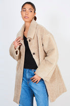 Beige thick fuzzy coat_1