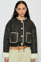 Black and ivory fuzzy lined circle quilted jacket_1