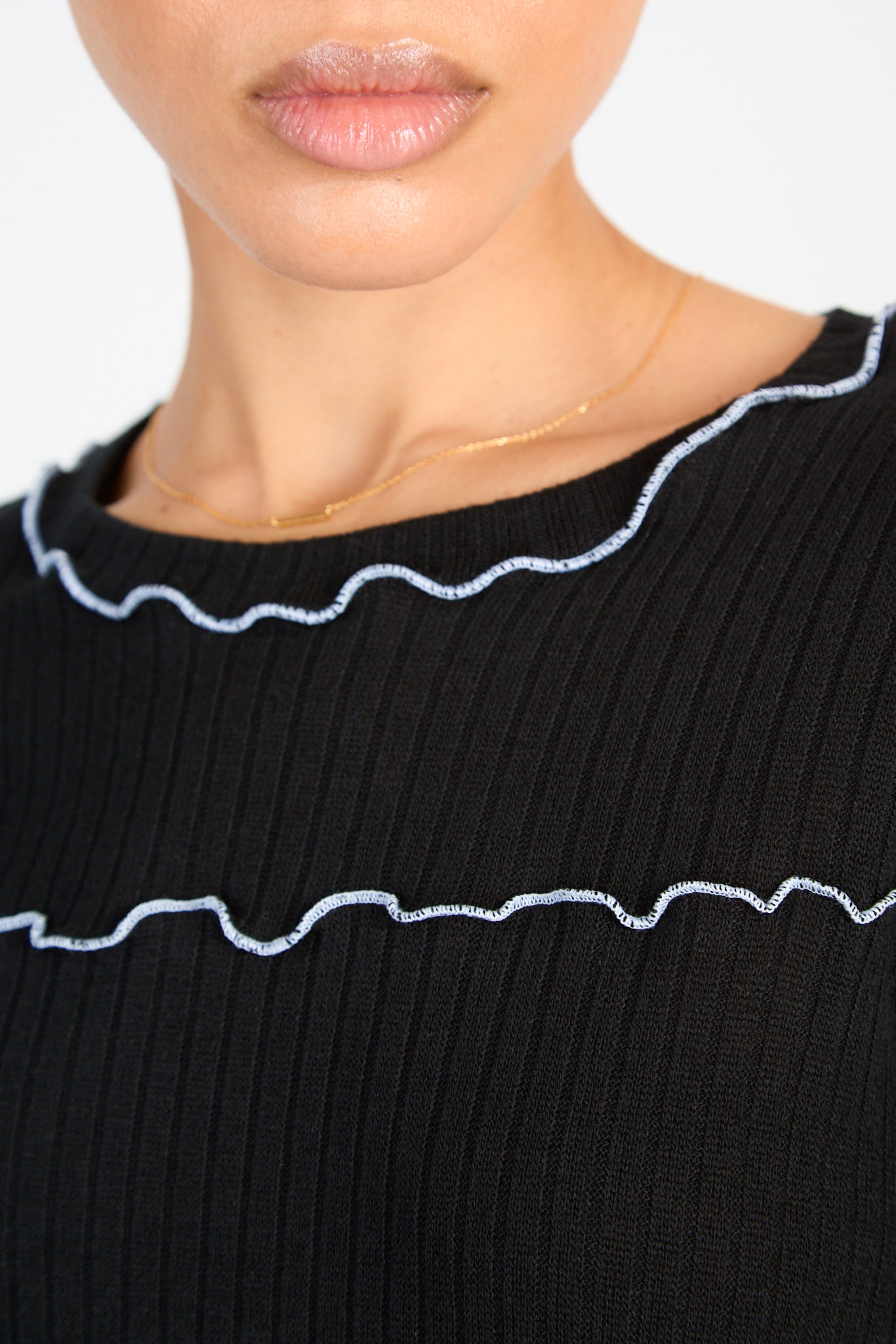 Black and white horizontal trim long sleeved top