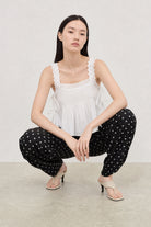 Black and white polka dot linen blend slouchy trousers_5